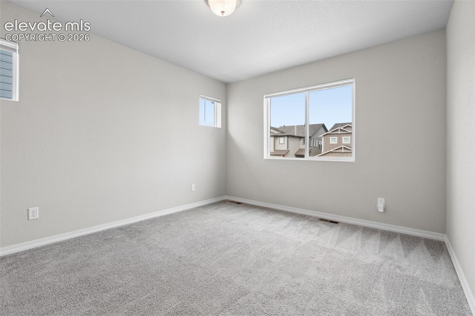 The grand Primary Bedroom features an ensuite bathroom and a large walk-in closet!