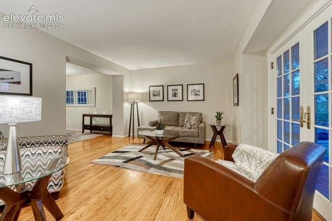 Living room on main with walk out to covered 
front porch