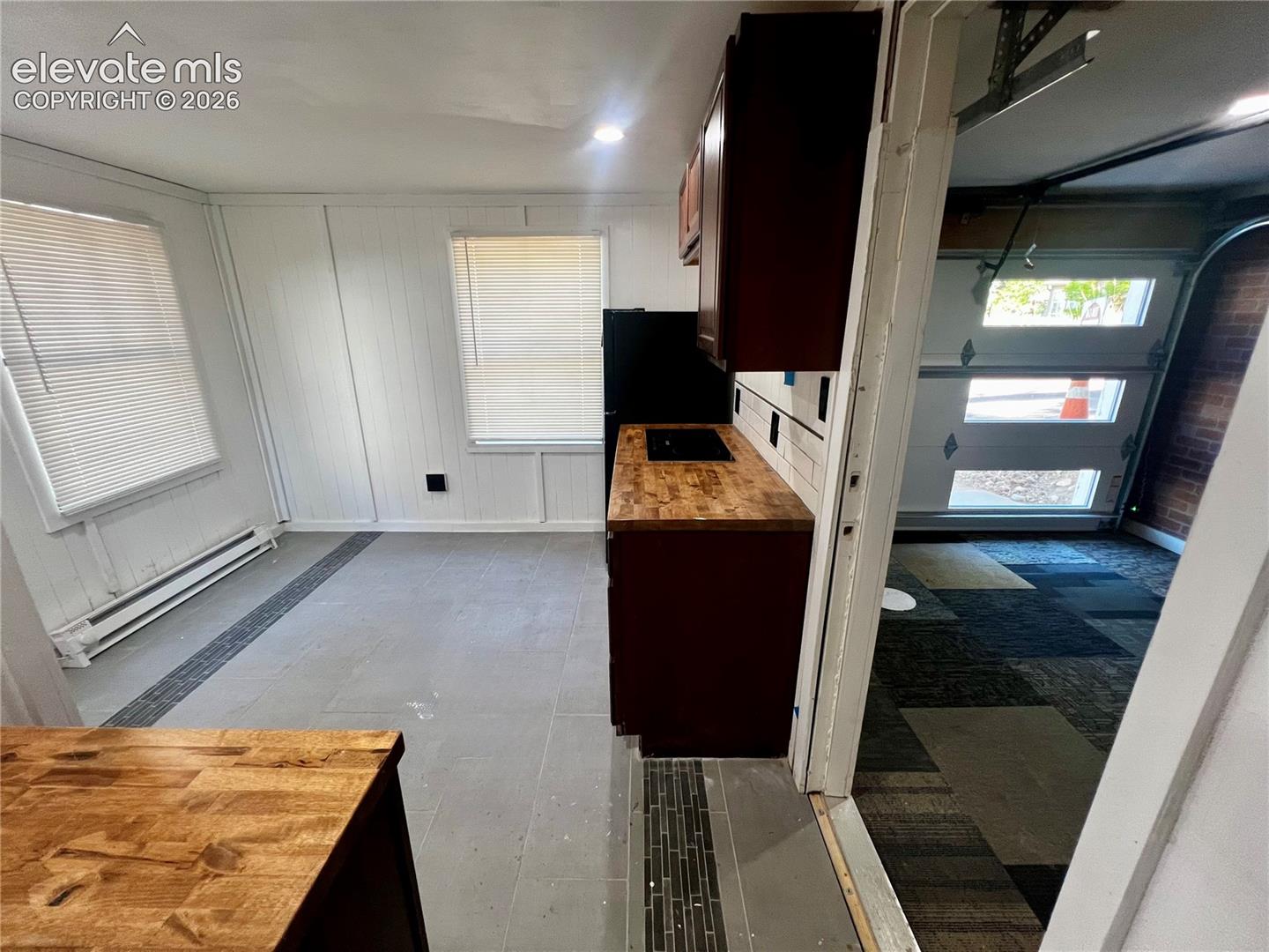 Lower Apt: This studio has been completely renovated. The garage is heated. All new electrical.