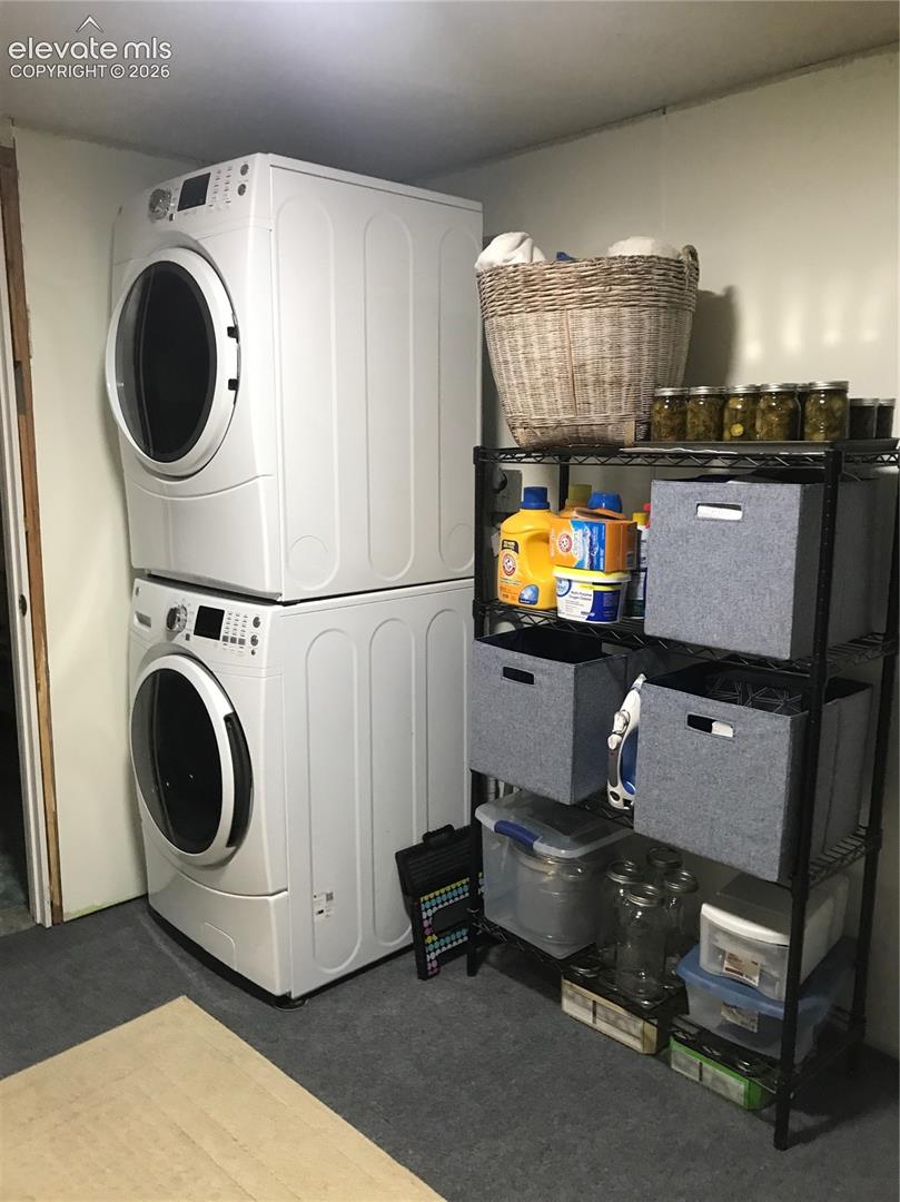 Spacious laundry area with room for storage and folding