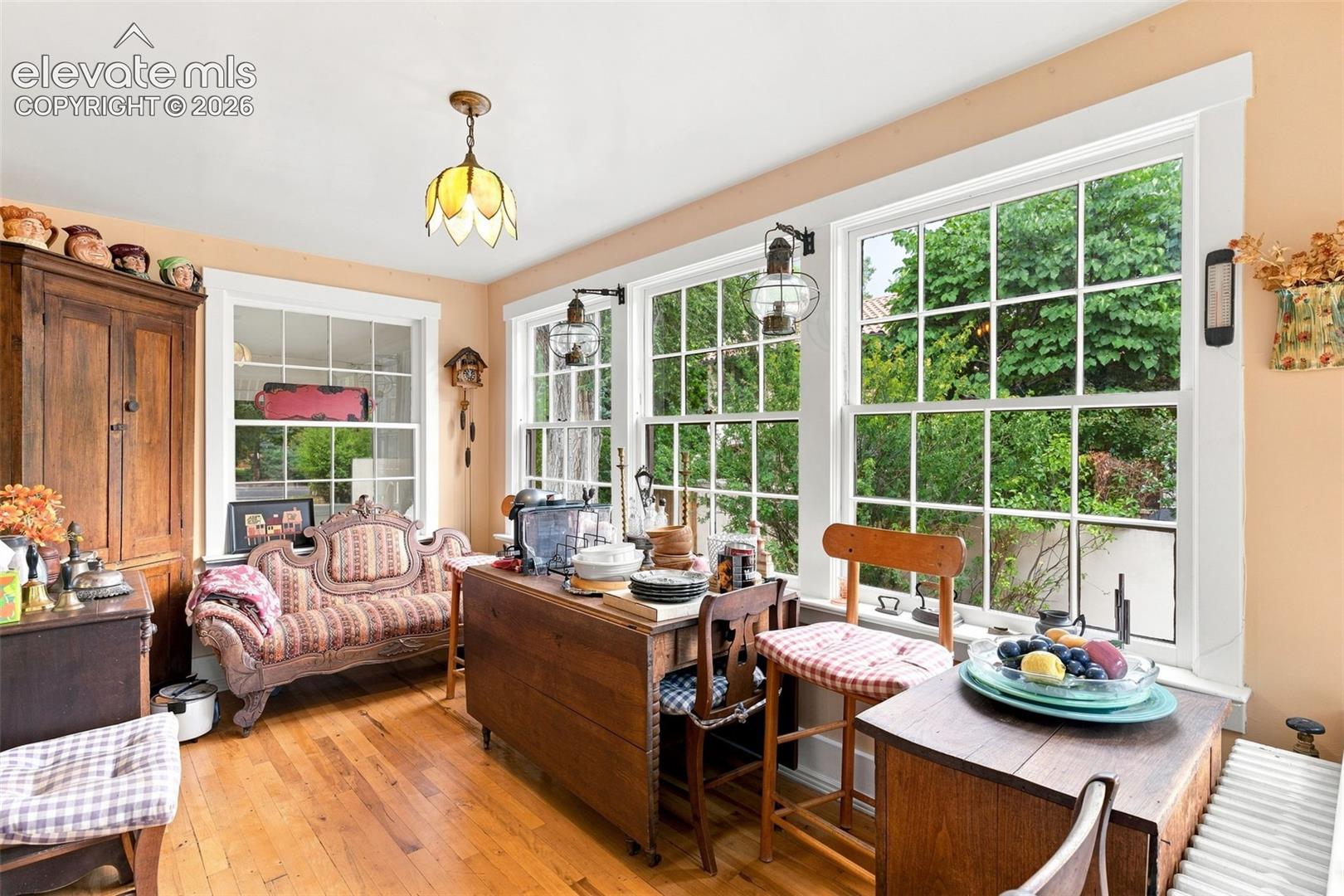 Sunroom off Kitchen with walkout to Back door