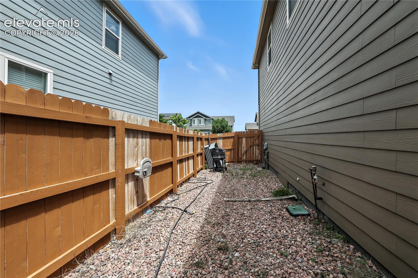 Wood privacy fence with gate