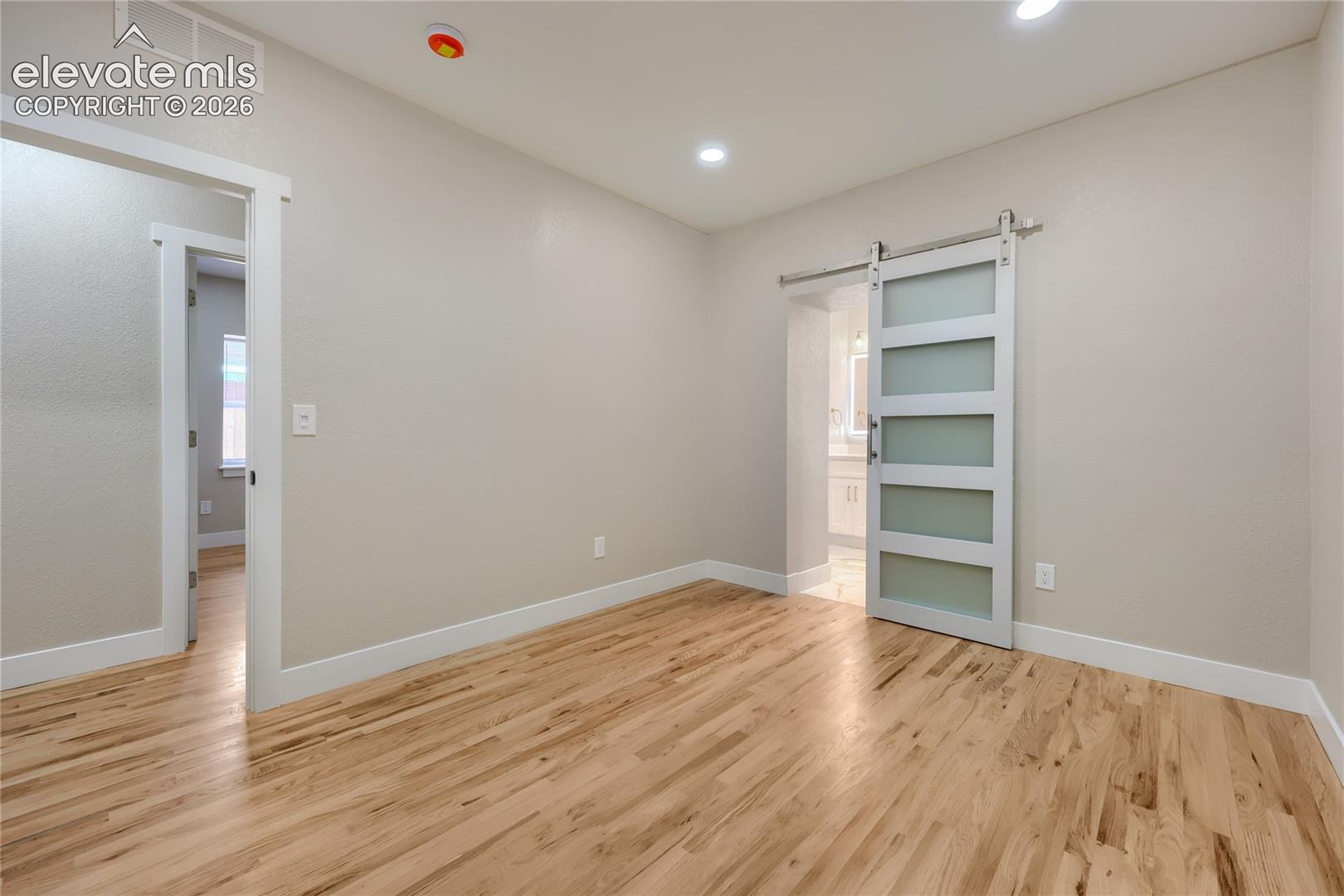 Another view of your roomy primary suite.