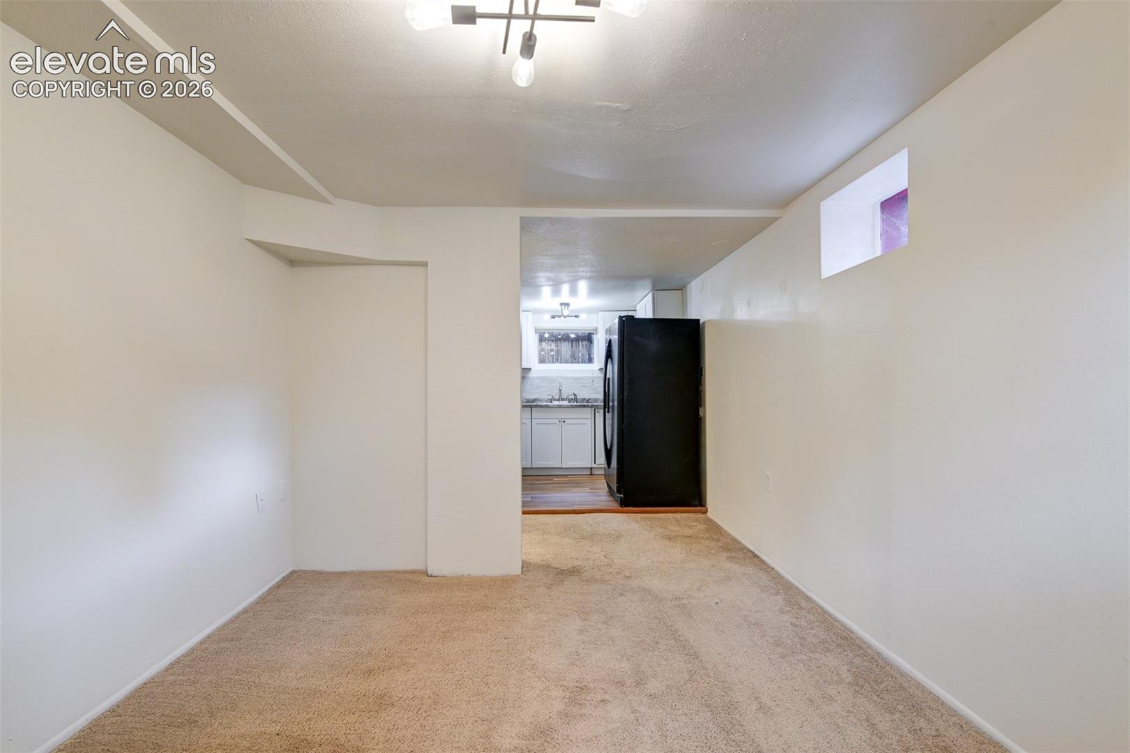 Basement unit located in the back of the property 