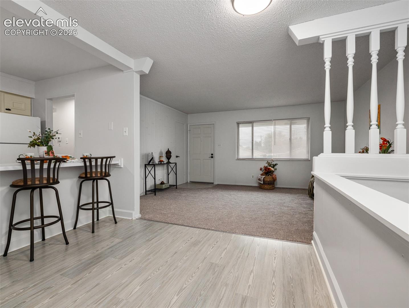 Adjacent to the kitchen and has outdoor patio/back yard access