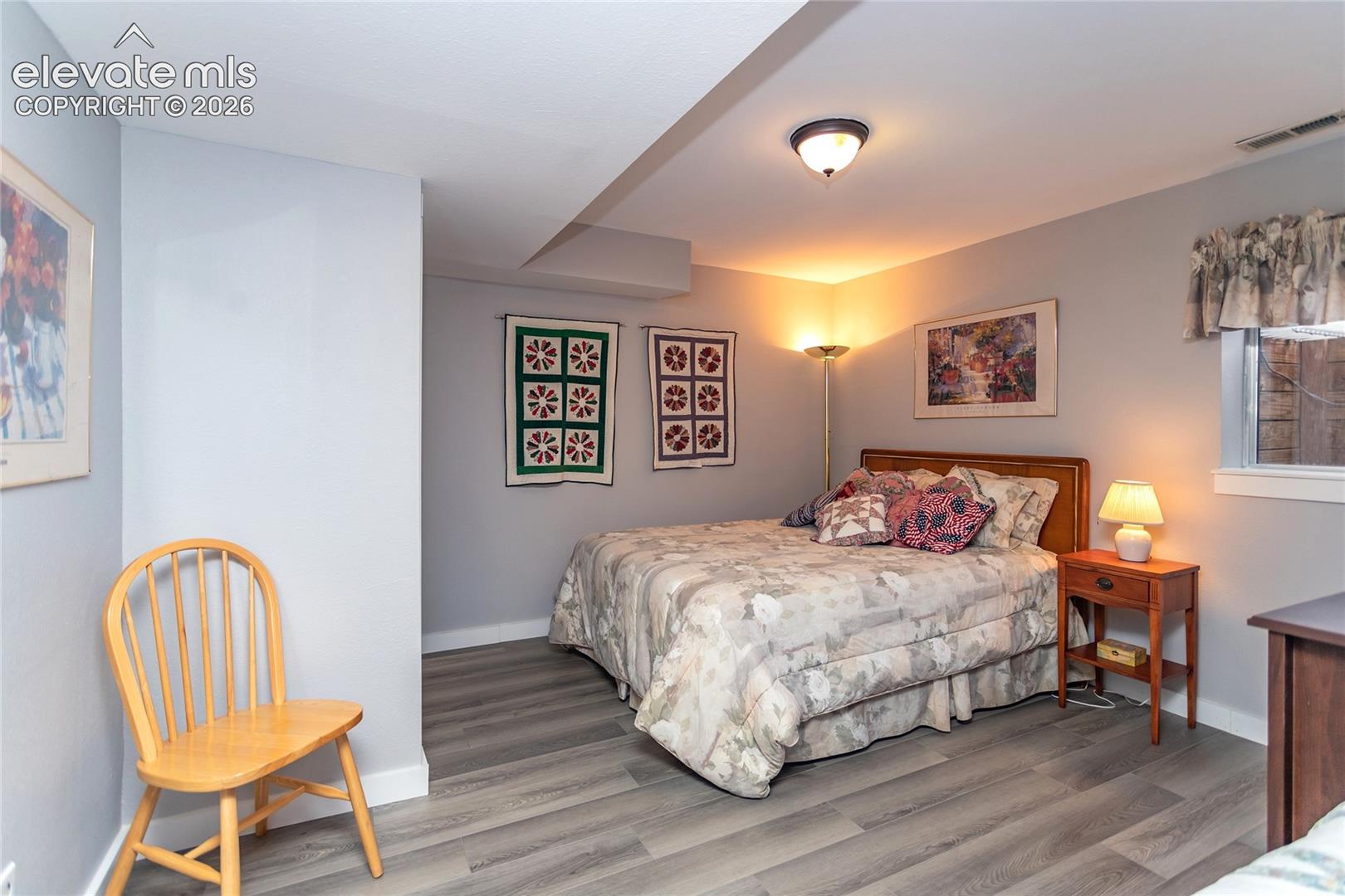 Fifth Bedroom is on Basement Level and has Laminate Flooring