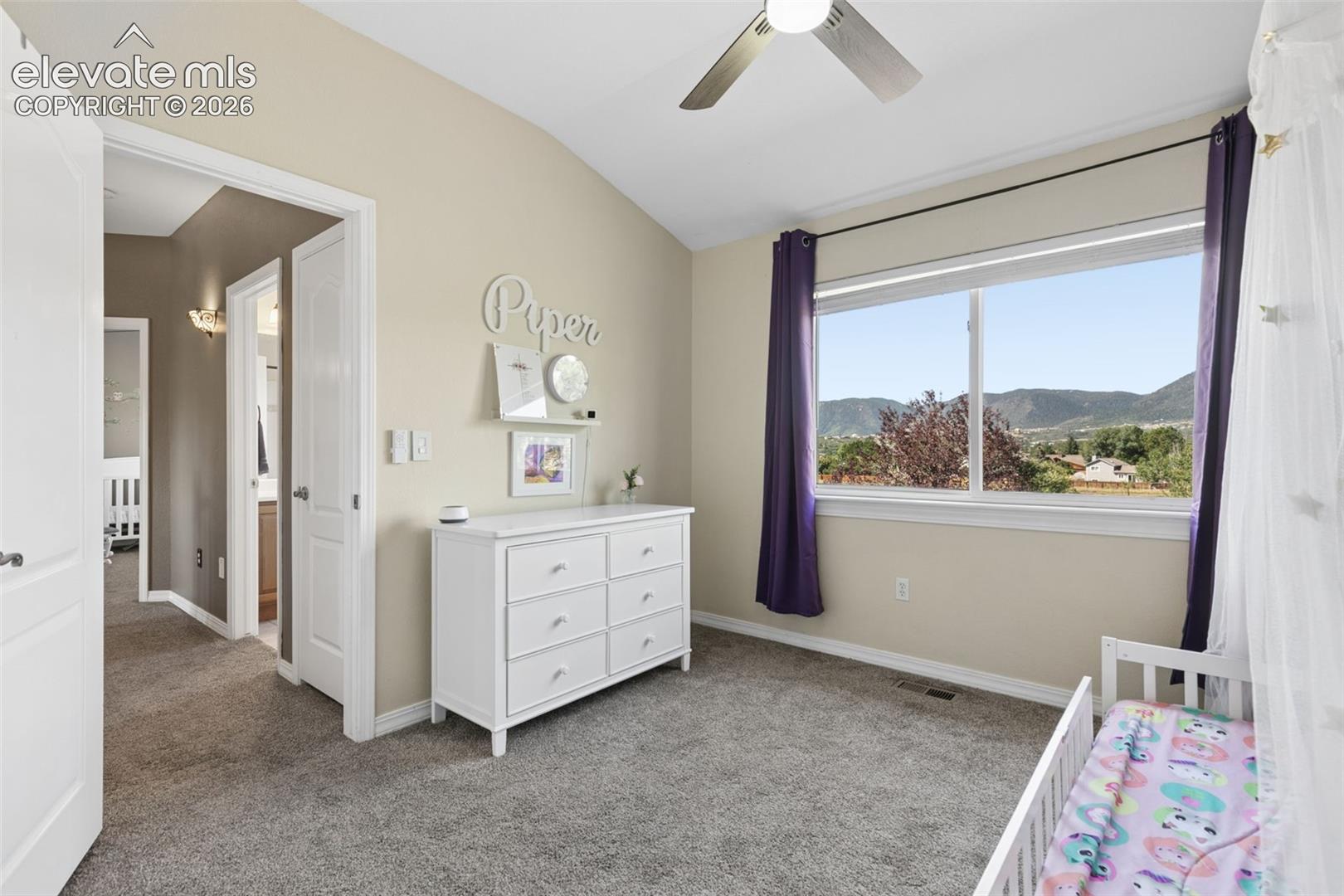 Vaulted ceiling with an attached ceiling fan