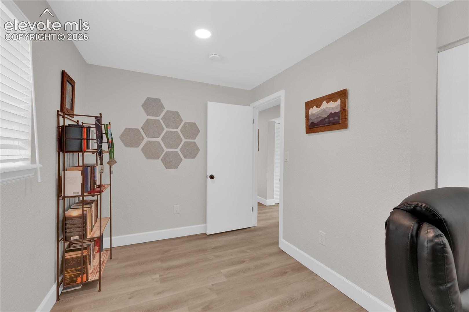 Fourth bedroom or office on lower level with walk-in closet.