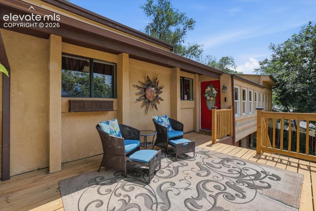 Spacious front deck with sweeping Front Range views.