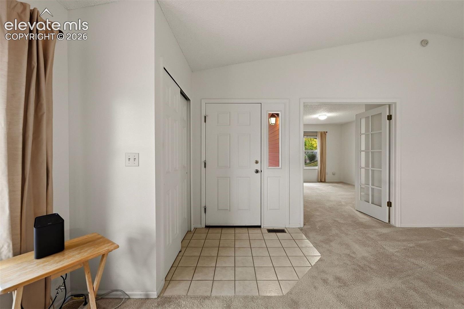 Entry and fourth bedroom
