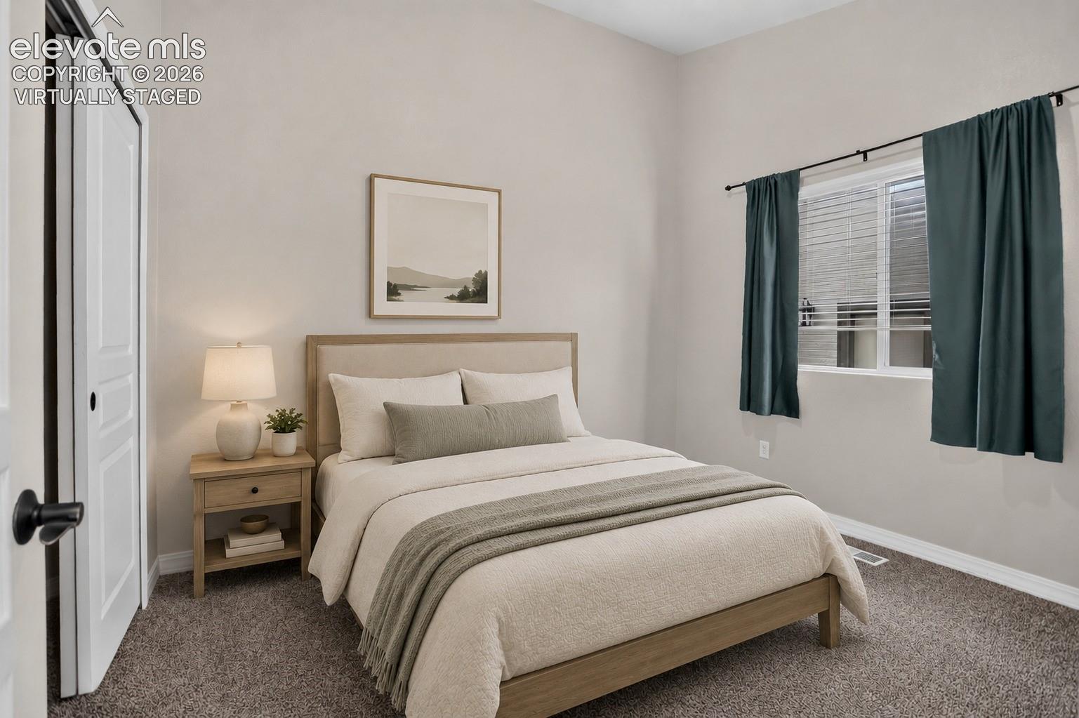 Virtually Staged - Carpeted flooring, neutral wall paint, and a window with blinds