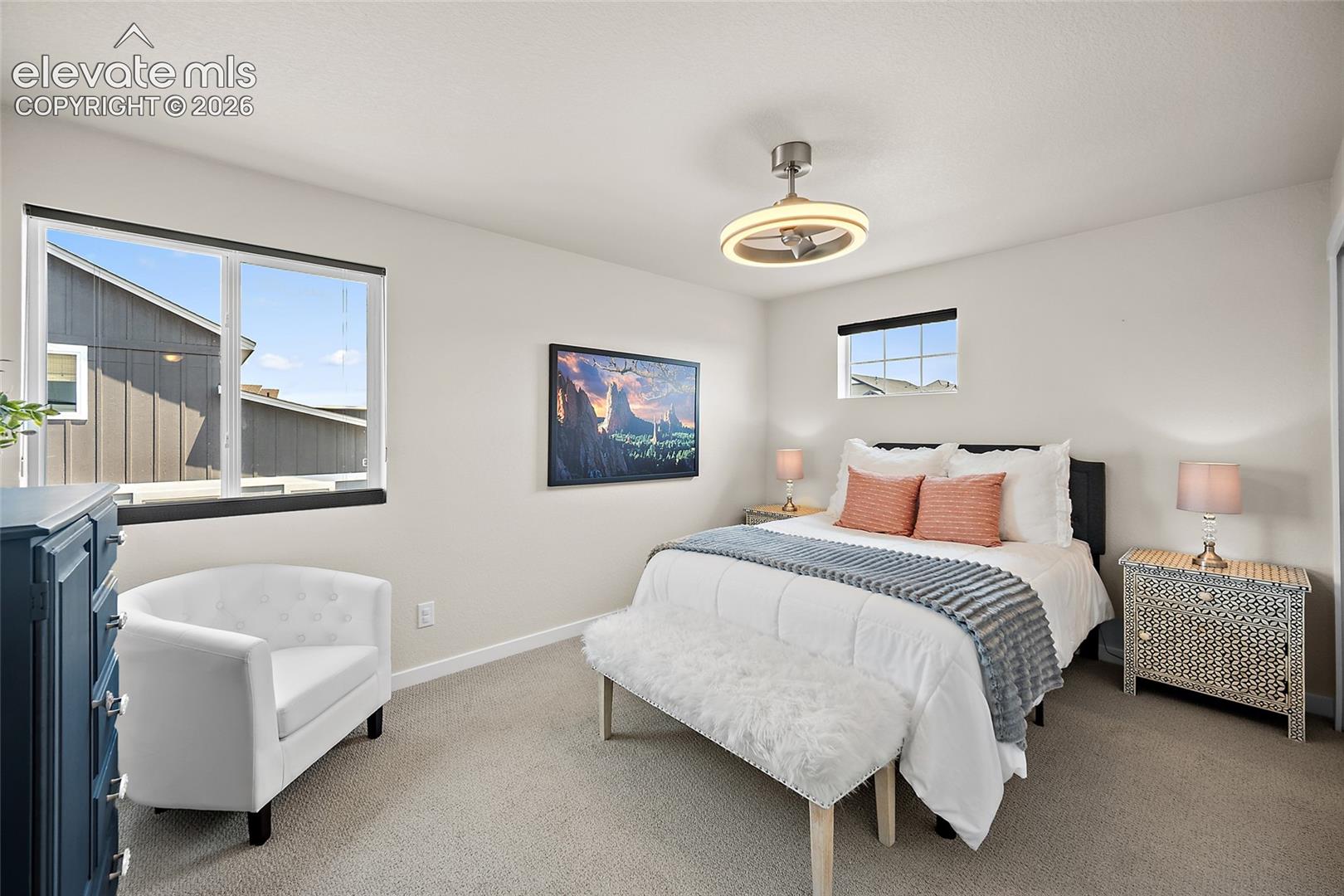 contemporary ceiling fan, dual windows.