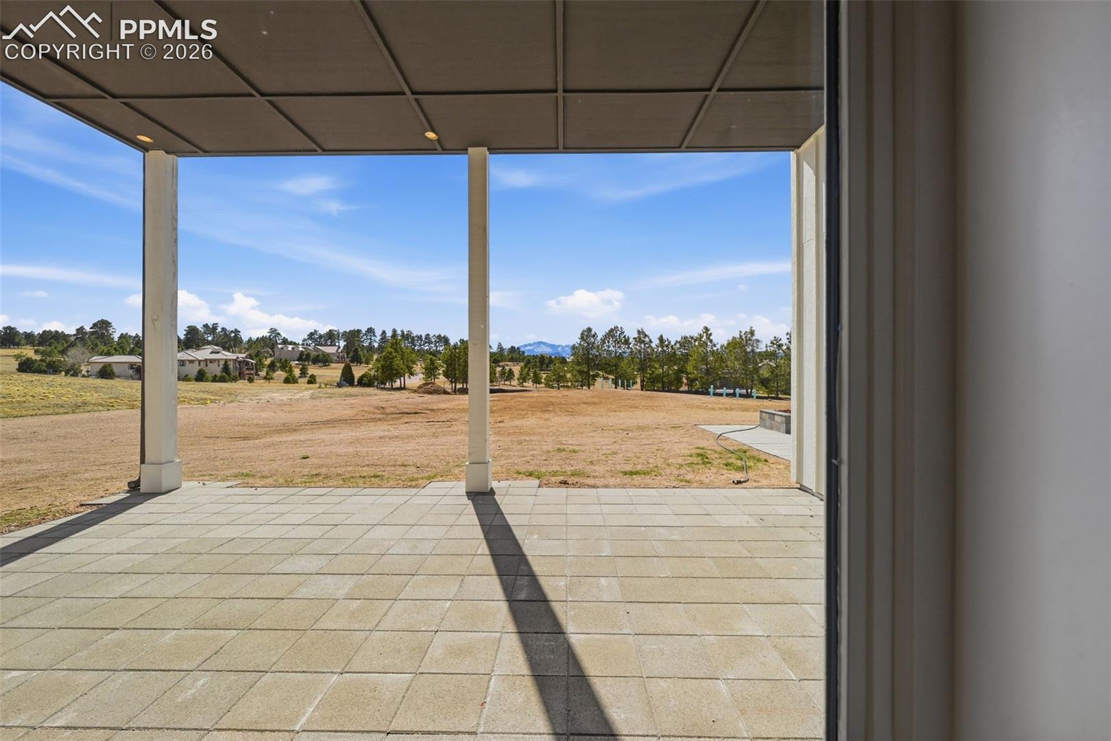 View on patio from walk-out on Lower-Level Family Room