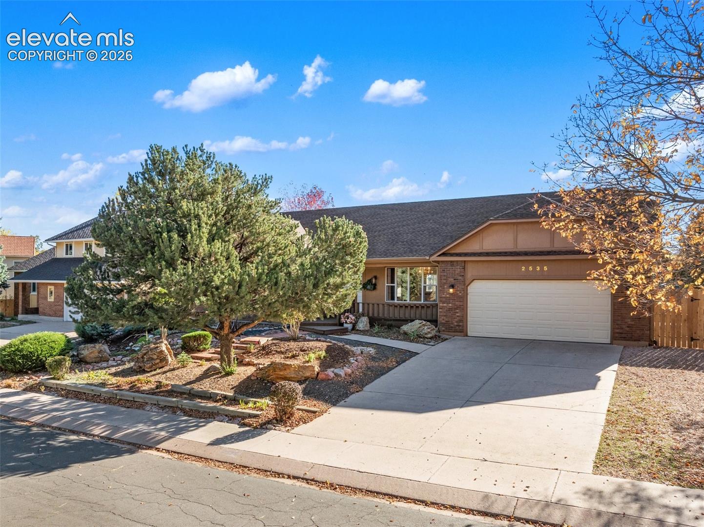 LOCATION & VIEWS!*CUSTOM BUILT*1/5 ACRE*STUCCO*MAIN-LEVEL LIVING*ROOF 2018*484 SQ FT GARAGE W/WORKBENCH*FULLY XERISCAPED FENCED REAR YARD W/MATURE TREES*Welcome to your very own private oasis! This custom built true main-level living rancher in the highly coveted Mountain Shadows community has been extremely well-maintained and is ready for your cosmetic updates! From the moment you arrive to this wonderful property, you'll have difficulty deciding if your days will be spent in the warmth of your home cozied up to the wood-burning stove or exploring all the nearby hiking trails, natural wonders & attractions including Garden of the Gods, Blodgett Open Space, Rockledge Ranch, & Ute Valley. As you enter the home, the natural light, vaulted ceilings in the living room & hardwood floors in the kitchen will beckon you in. With the primary en-suite and laundry room on the main floor, this home provides for true main level living, and this level also has 2 additional spacious bedrooms. Downstairs, you'll enjoy an abundance of storage and a large craft room that has endless possibilities.  With 2 more sizable bedrooms downstairs, there is plenty of room for your family to have their own space or plenty of room for guests.  One of the lower level bedrooms has an attached 1/4 bath for convenience in addition to the amply sized full bathroom on the same level.  All but one lower level window is garden level allowing for light to pour into the amply sized family room. Your backyard is the perfect size and is fully xeriscaped and fenced with many trees that have been well-maintained to include a very special peach tree. The garage is oversized with a workbench as well as an abundance of cabinetry and shelving. Come see this gem today!  You'll never tire of the surrounding views nor will you tire of taking in the serenity of birds & wildlife. And all of this just ½ block to Chipeta Park & Elementary school. You won't be disappointed in visiting this beautiful home and community!