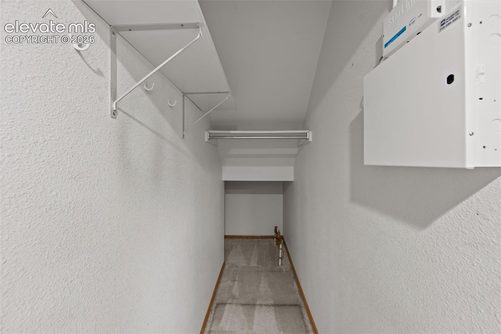 Spacious closet under stairs