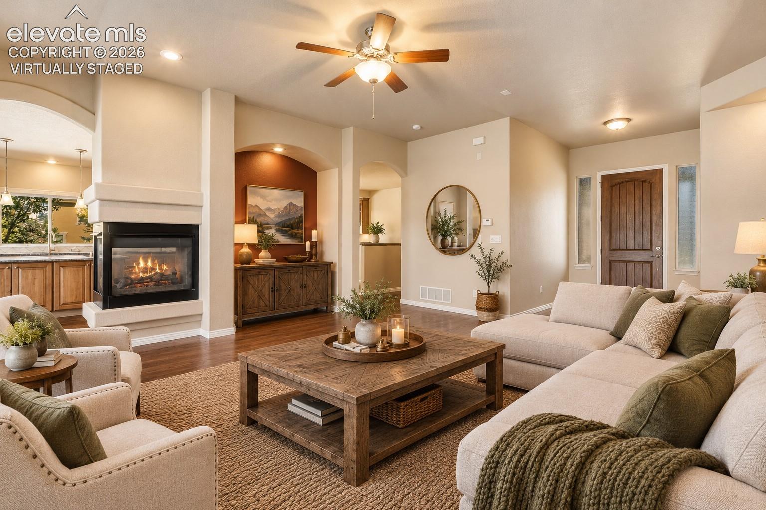 *VIRTUALLY STAGED* - ADDITIONAL VIEW OF LIVING ROOM WITH FIREPLACE & CEILING FAN