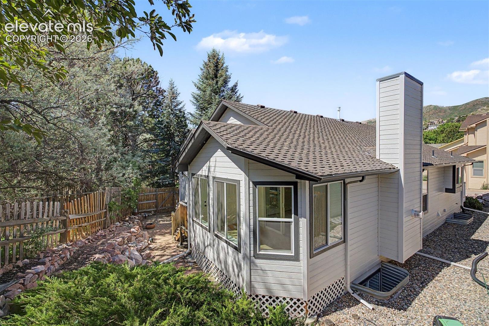 Back of home, minimal/low maintenance landscaping
