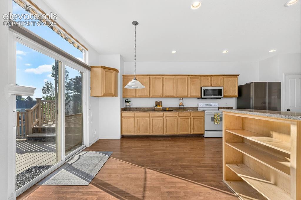 Eat-in kitchen leads out to the deck