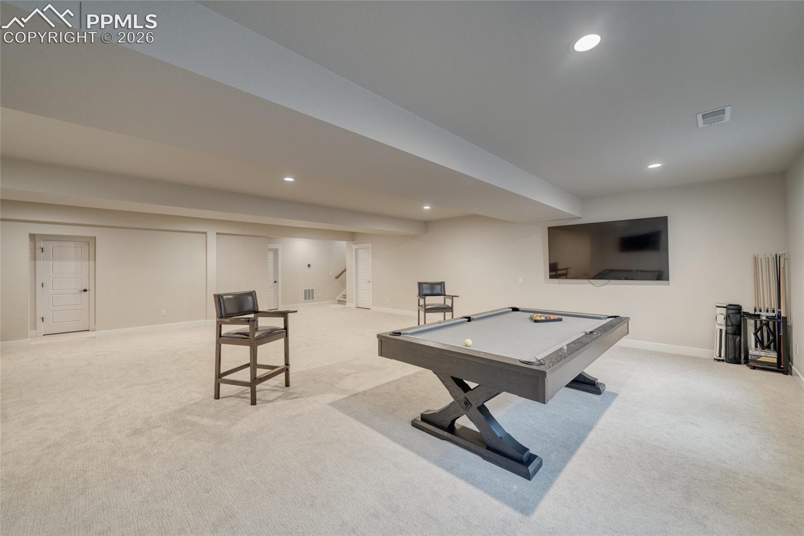 Recreation room featuring billiards, light carpet, and recessed lighting