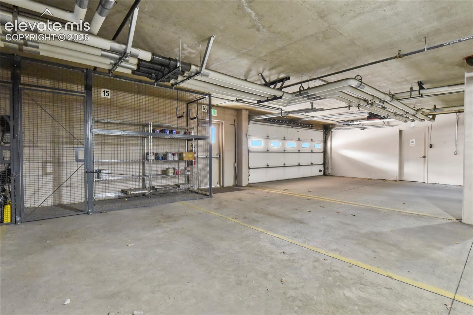 Private underground heated garage with 2 parking spaces