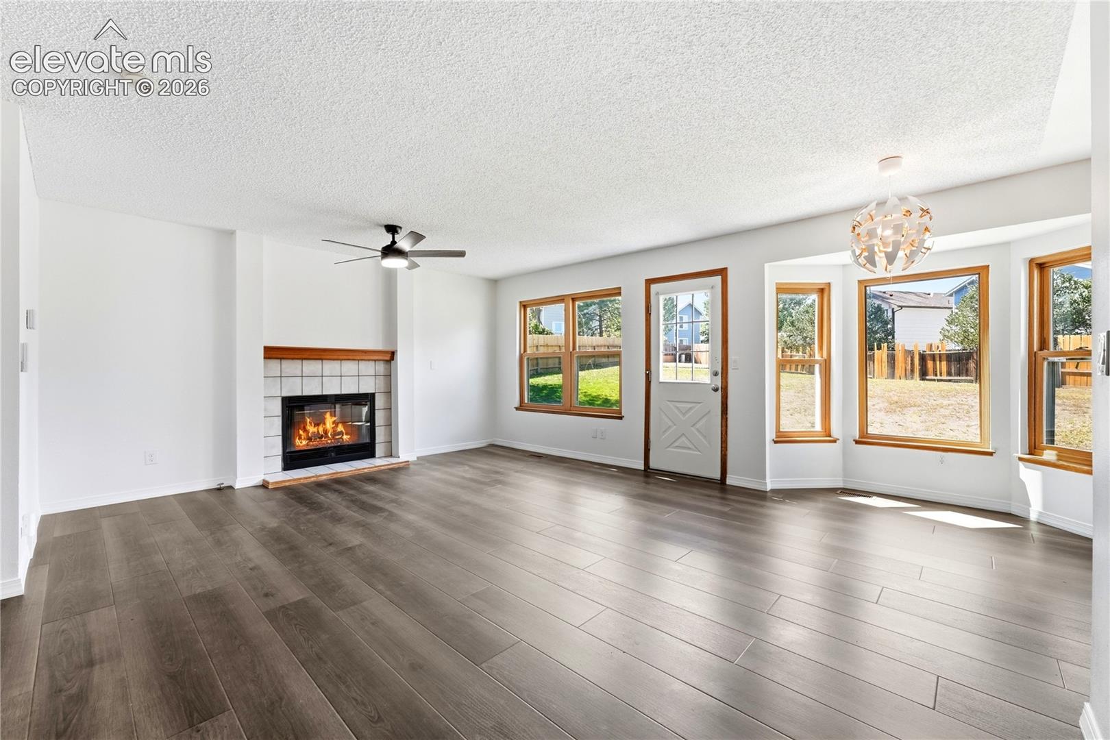 Dining area with new LVP flooring, and additional living room or family room