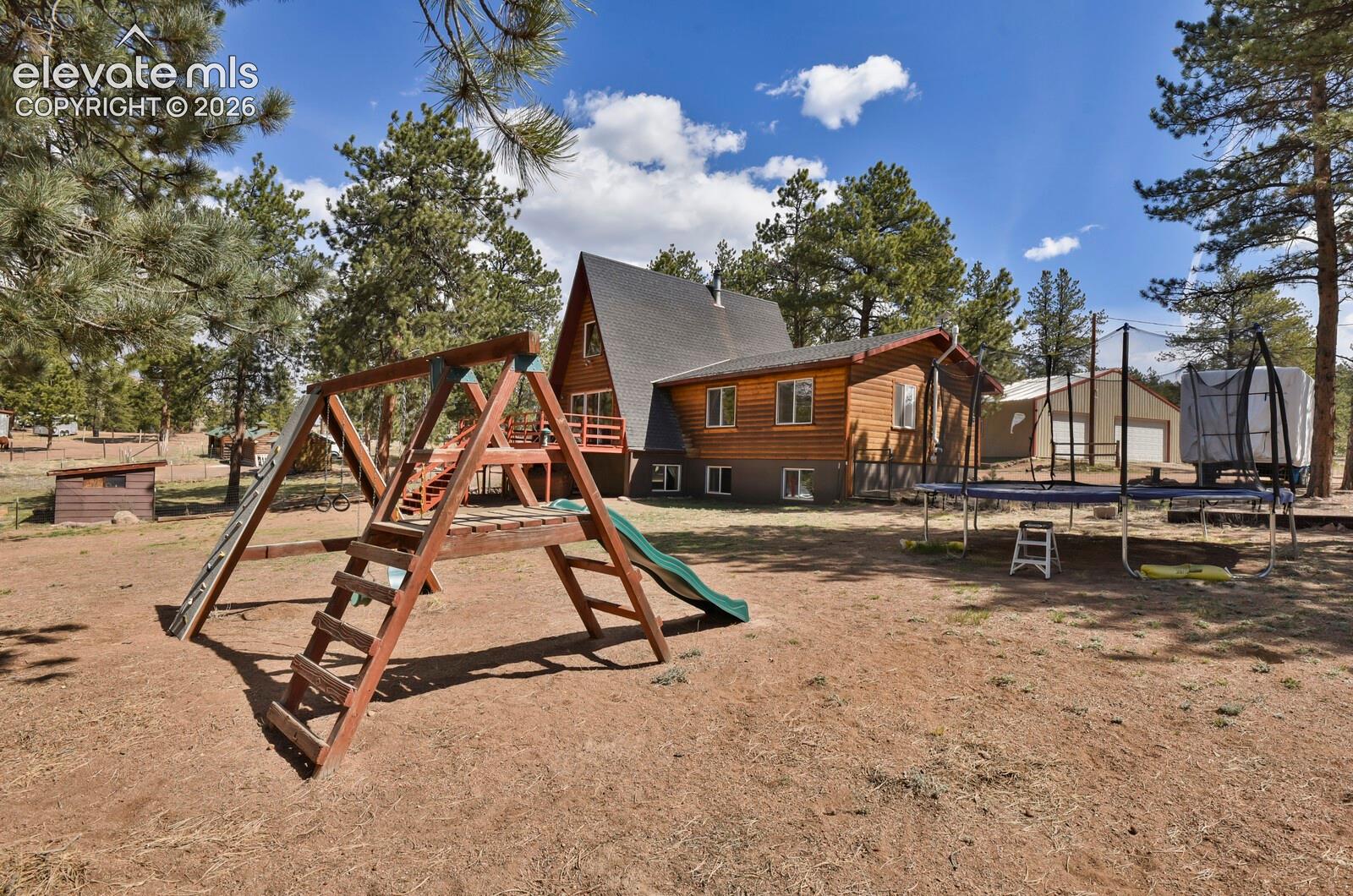 Fenced in backyard area for dogs, kids, and play