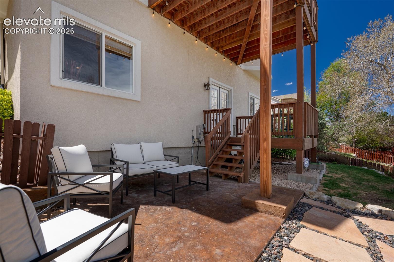Enjoy summer evenings on the back yard patio overlooking the park.