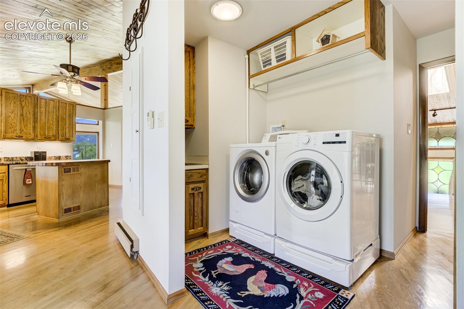 Laundry is right around the corner of the kitchen.