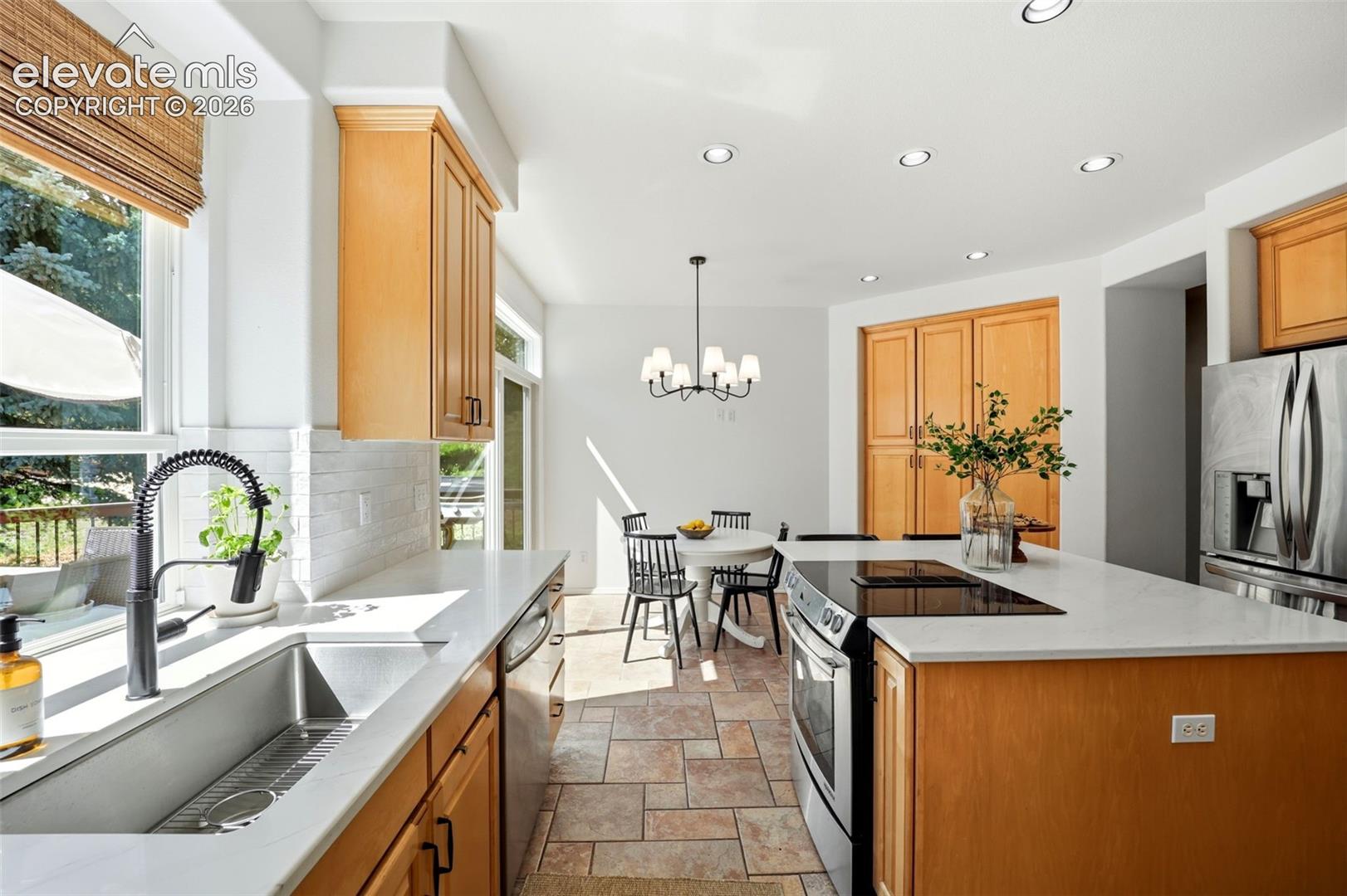 Eat in kitchen the opens to the deck - perfect for entertaining!