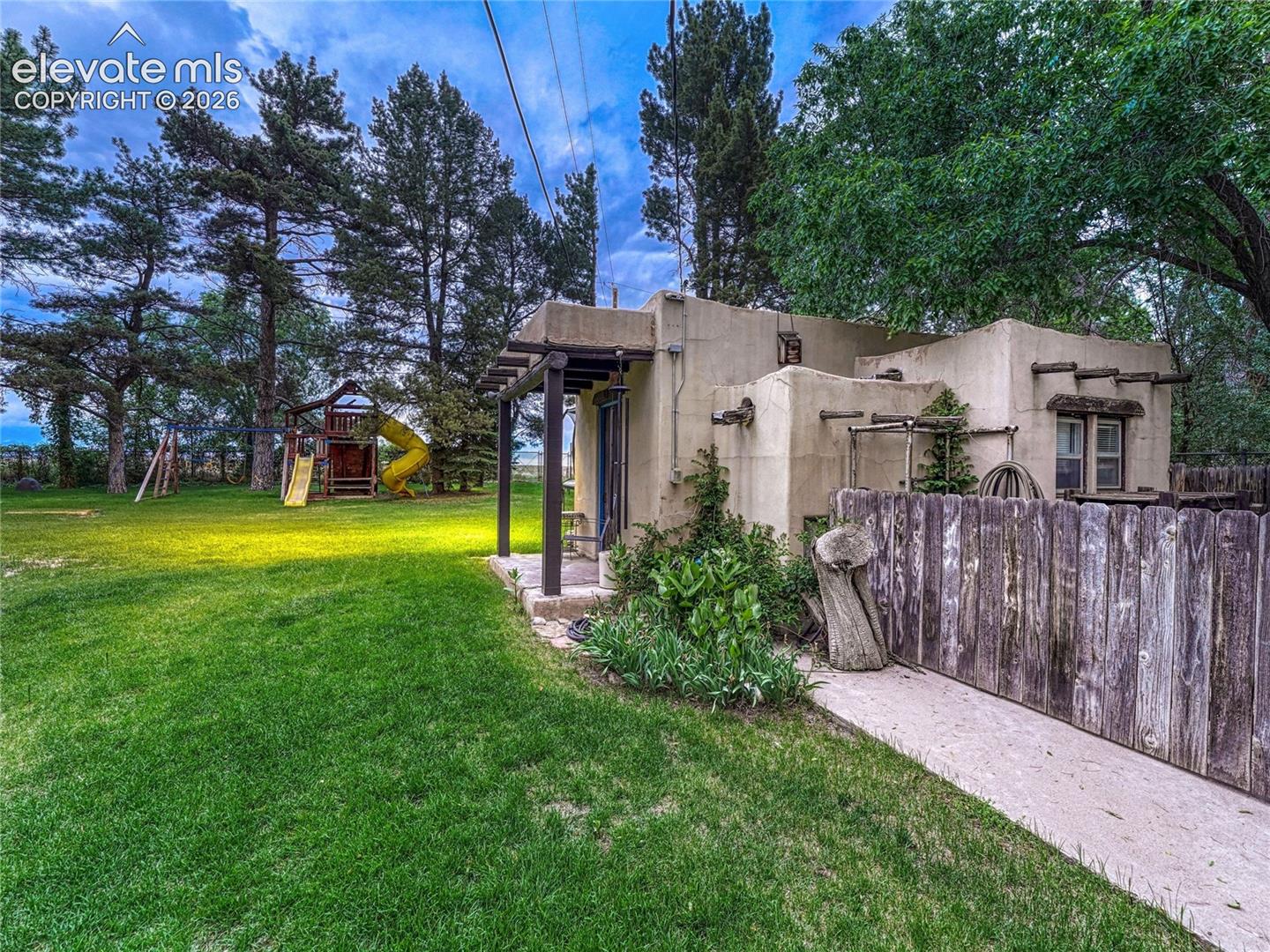 Expansive lawn/playfield for recreation and gatherings