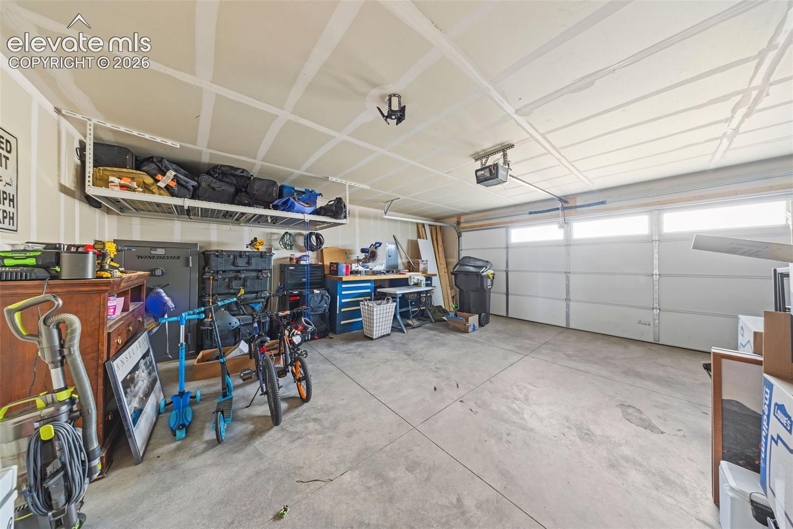 You have too much crap. I have too much crap. We ALL have too much crap. But it's GOOD crap, so store it well in the attached two-car garage. Overhead storage means you can hang onto ALL your good crap and still have room for cars. Because, that's also a great use of a garage. 