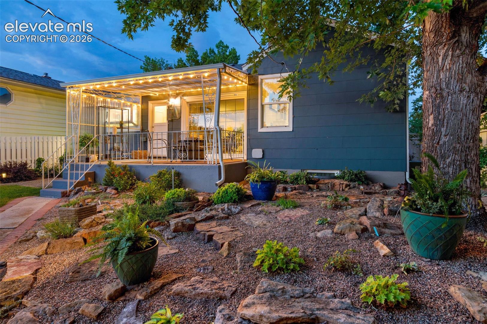 back covered patio, nice landscaping