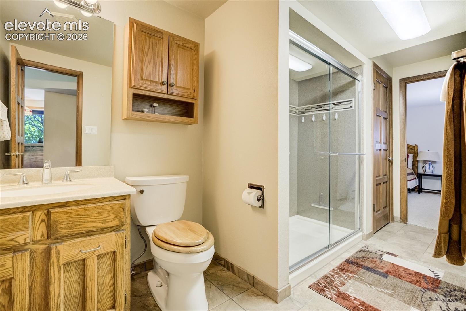 Lower level bath may be accessed from family room or bedroom 4.
