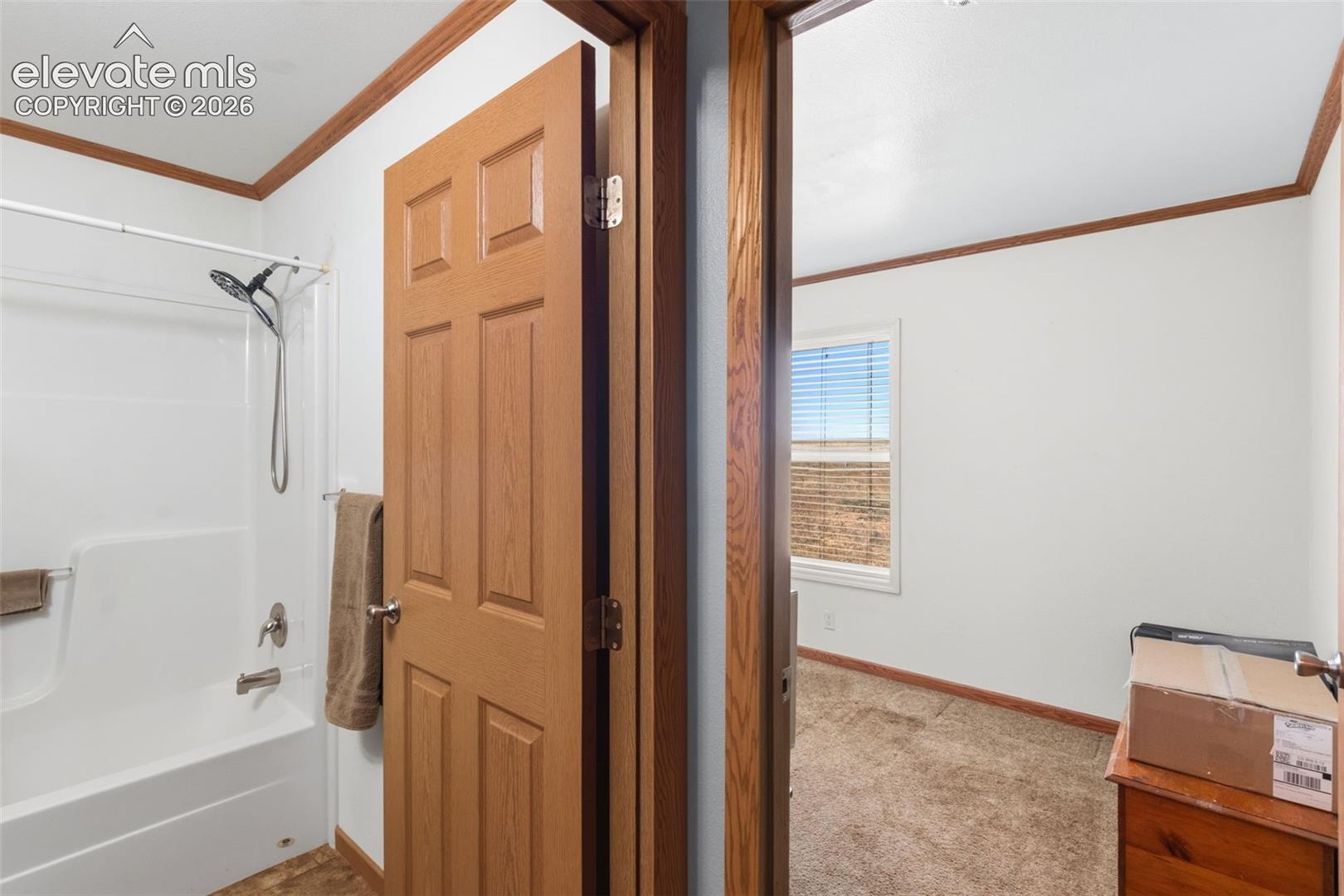 Hall way to full bath and north bedroom.