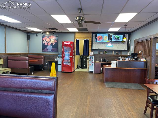 Welcome area featuring a paneled ceiling