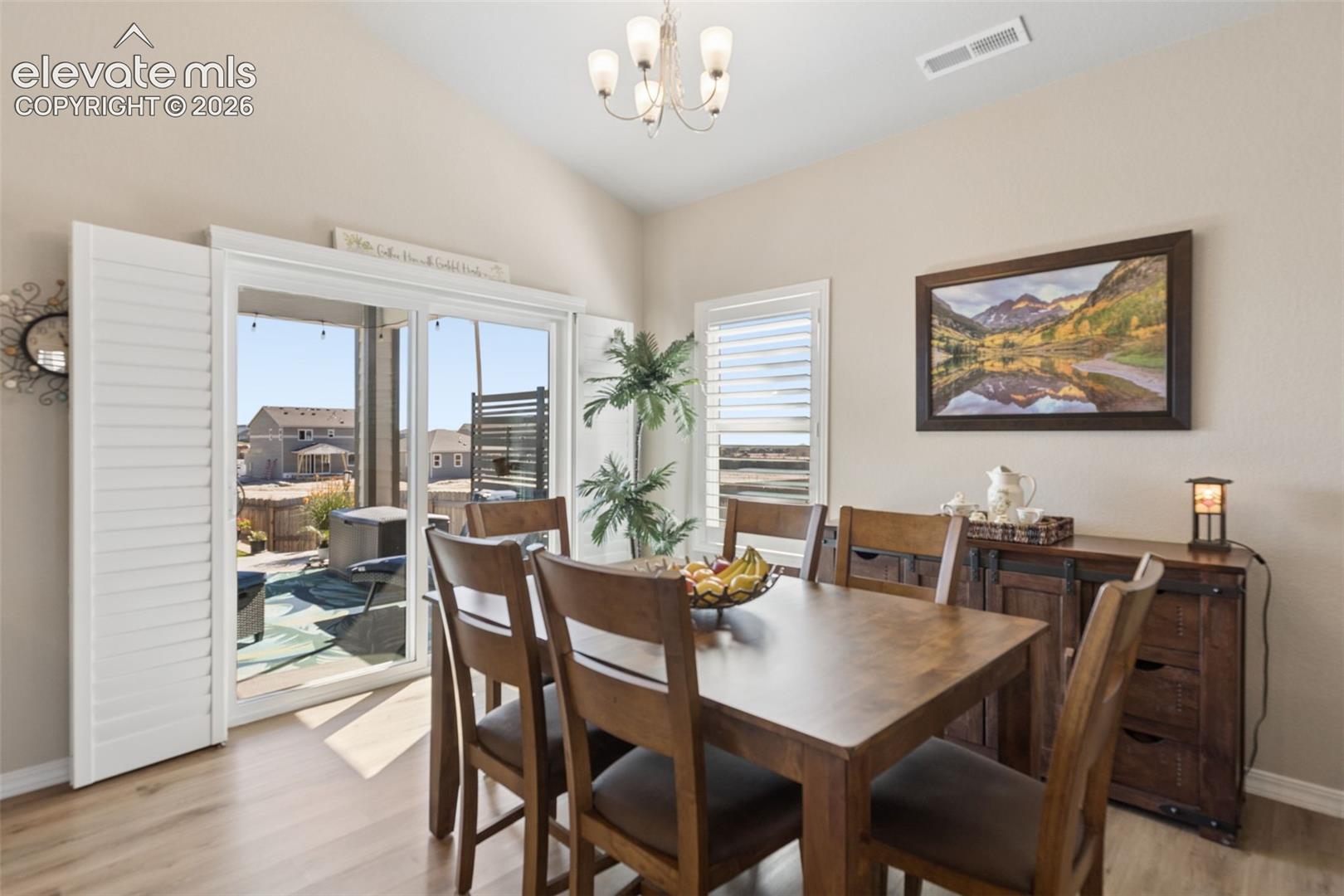 The kitchen and dining area have easy to clean LVP flooring.
