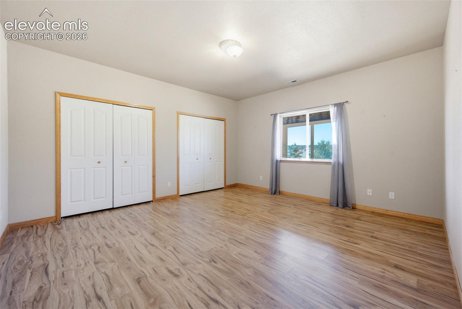 One of two lower level bedrooms