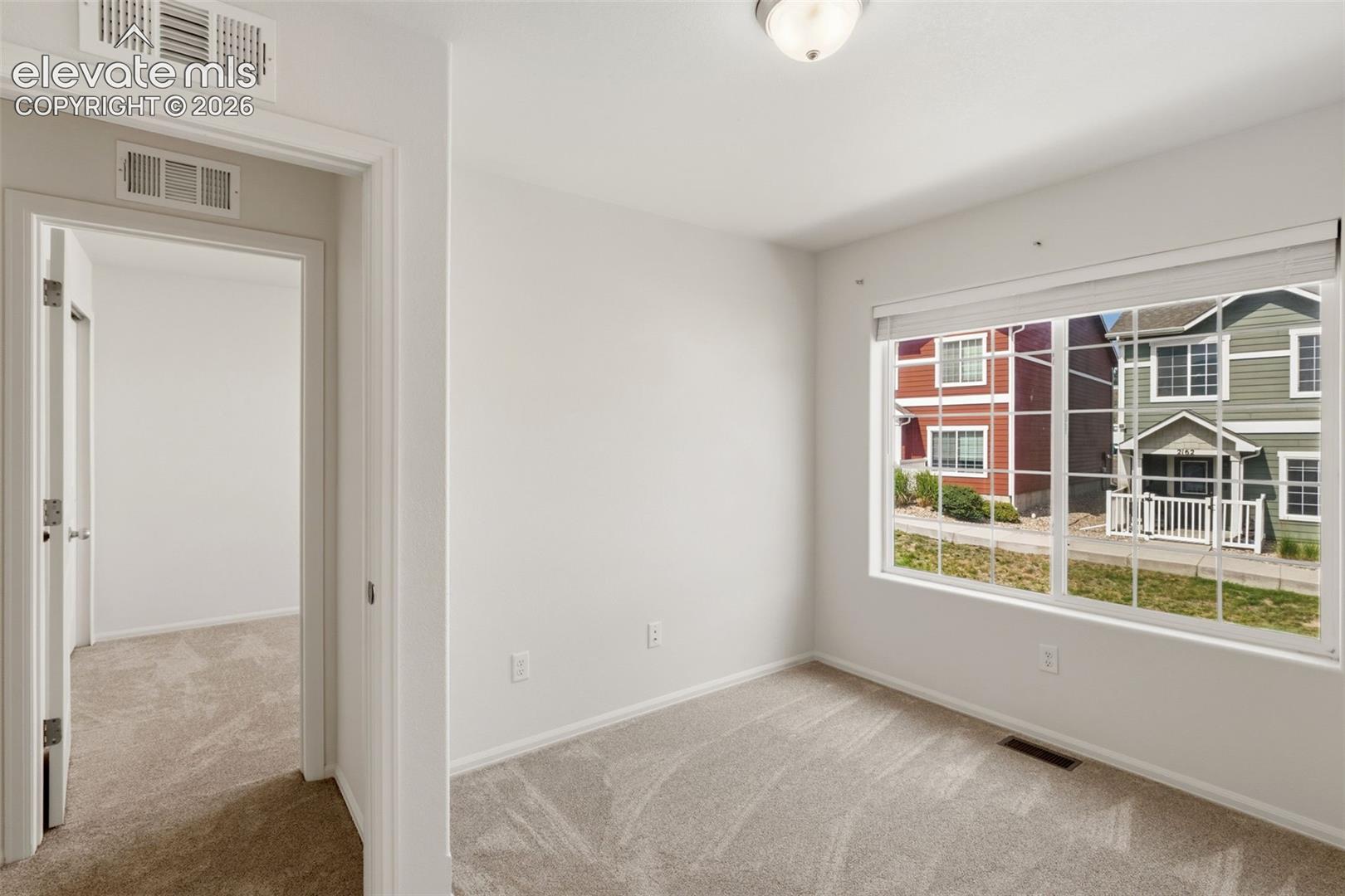 Located on the upper level alongside the primary suite, this room is perfectly situated to keep loved ones close by