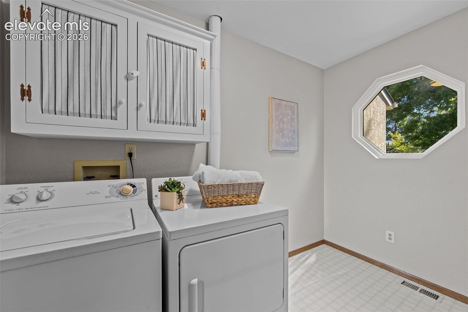 Awesome laundry room with tons of light