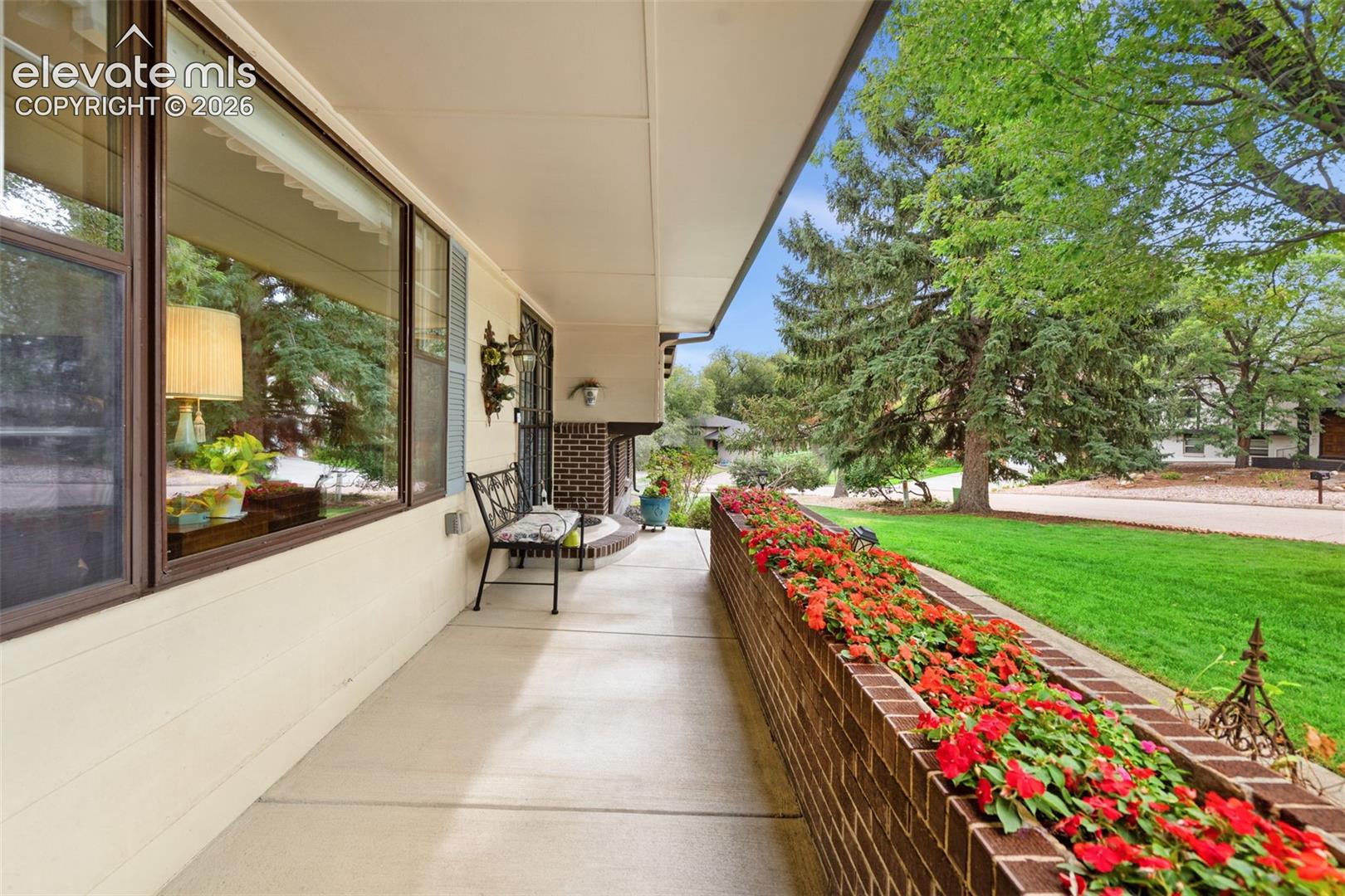 Front breeze way with flowers