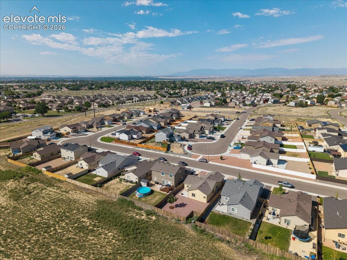 Residential neighborhood featuring paved streets and varied home designs