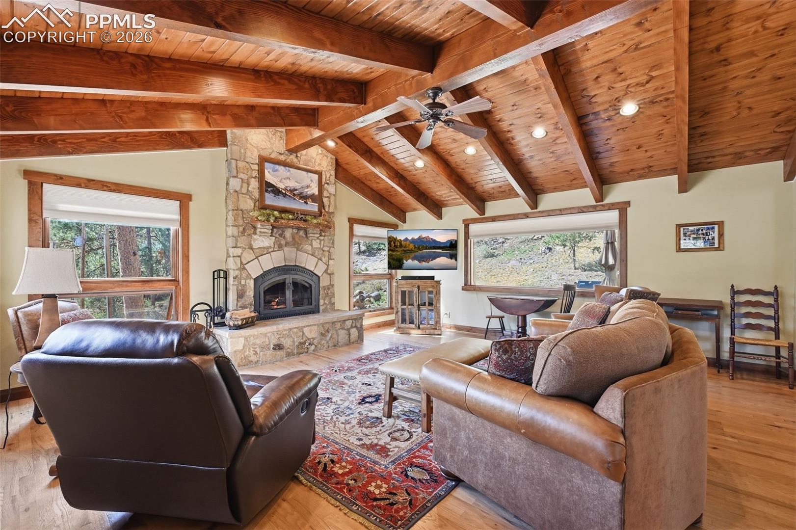 The first of two captivating fireplaces on this level, this wood-burning fireplace offers a great focal point and provides a cozy source for secondary heating