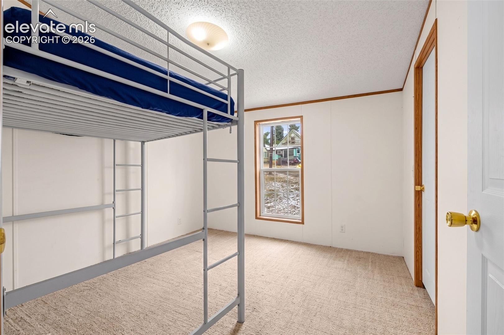 Secondary Bedroom w/ Walk-In Closet