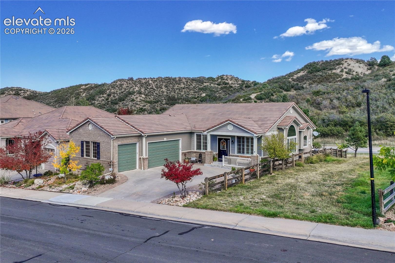 AMAZING ONE STORY HOME WITH BREATHTAKING VIEWS, backs to the Ridgeline Trails Open Space Area and adjoins to a wild life passthrough/greenbelt area, near the top/end of cul de sac road. Oversized 3 vehicle garage, no maintenance yard, large newer composite deck, class 4 cement tile roof, natural lighting throughout, full finished basement with lots of storage, well loved & maintained home are only a few bonuses for this property. Main level is open with a gourmet kitchen-double oven, gas cook top, slab granite counter tops, stunning stone backsplash, upgraded maple cabinetry-3 sided gas fireplace, office, sizable formal dining area, hardwood flooring, vaulted ceiling, laundry room with a sink/cabinets/shelving, 2 bedrooms, and 2 bathrooms. Spacious primary suite has great views, vaulted ceiling, 5 pc bathroom, deep soaking tub, walk-in closet. Professionally finished basement has 2 living areas, bedroom, full bathroom, and lots of unfinished storage room. Main entertainment room has a dry bar, slab granite counter tops, mini-frig, and built-in cabinets. Full wall credenza conveys with the property. Second living area is equally impressive with heated LVT flooring and many uses - Exercise room, crafts, work shop. Close proximity to hiking & biking trails, tennis & pickle ball courts, golf courses, hospital, schools, stores, restaurants, Outlets at Castle Rock, The Promenade, MAC, I-25, DTC, & more.