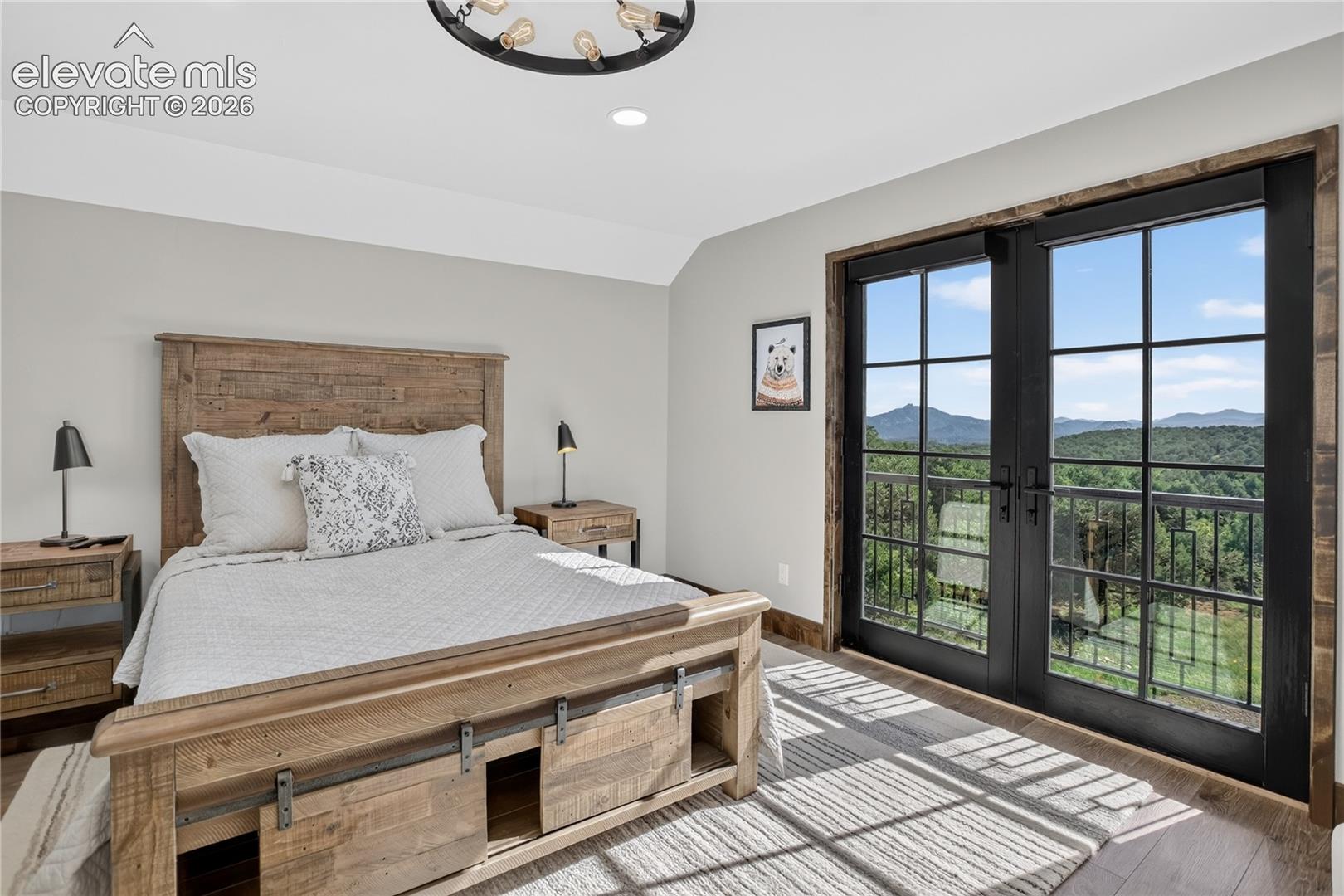 Bedroom 4 w/ balcony & mountain views - guest suite