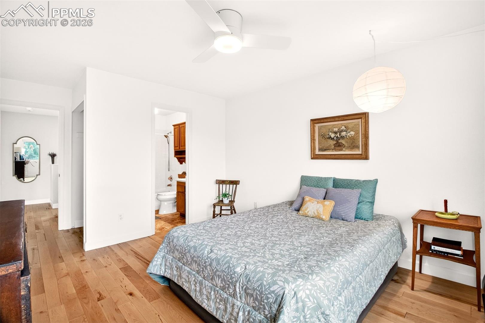 Bedroom with an adjoining full bathroom.