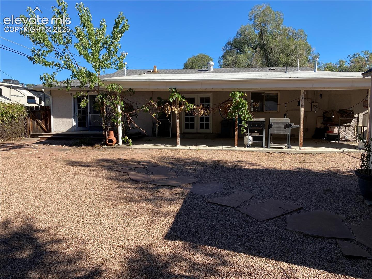 Two doors lead to the backyard. 