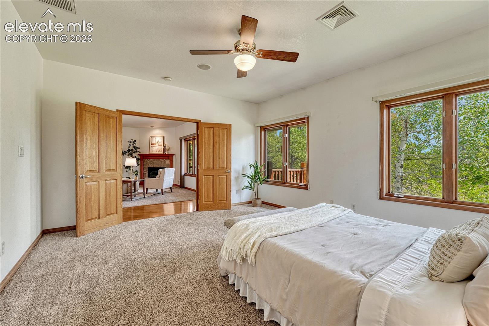 Primary bedroom easily fits a King size bed!