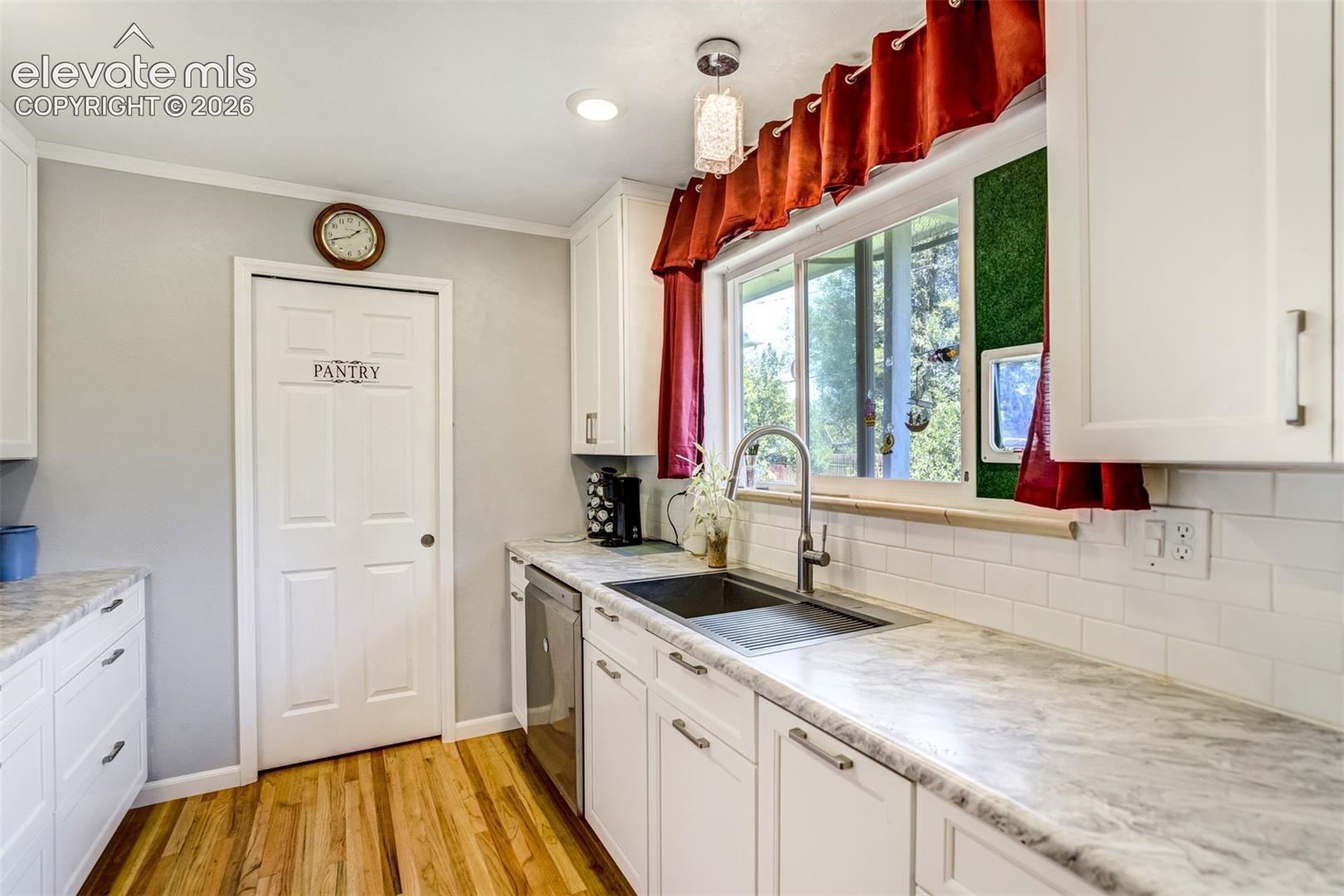 Recently updated kitchen, with large walk-in pantry.