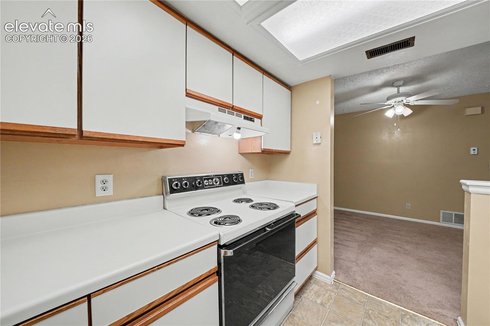 Kitchen with laminate counters and linoleum flooring